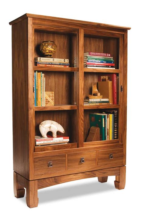 I matched the 2 billy bookcases with the oxberg doors but changed the knobs. Sliding Door Bookcase - Popular Woodworking Magazine