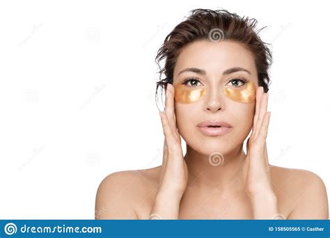 Woman Using Collagen Eye Patches To Prevent Skin Aging