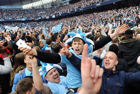 Victory Fans Storm Field After Manchester City Win