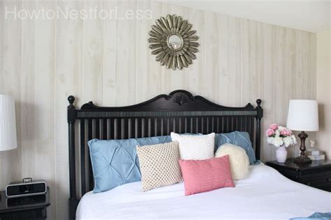 A full height head board rather than a full wall accent, the wooden panel is made from different size wood and arranged in random order. Master Bedroom Makeover Reveal! - How to Nest for Less™