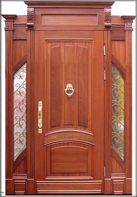 A Wooden Front Door With Glass Panels