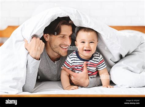 Baby Hiding Under Blanket Hi Res Stock Photography And Images Alamy