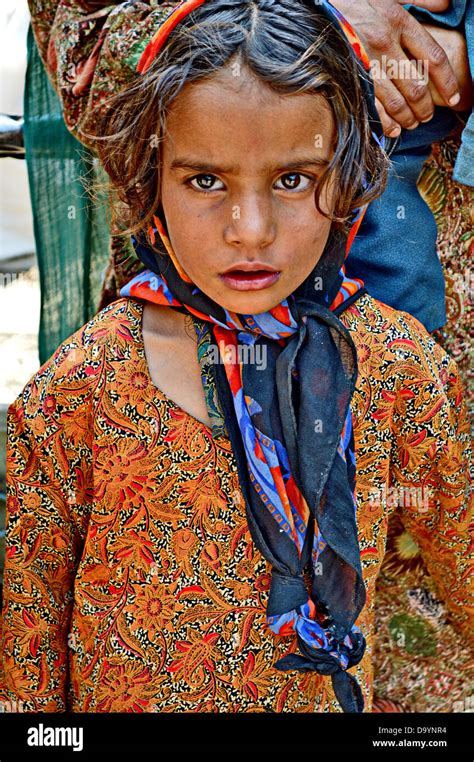 Little Girl Refugee Afghan Poor Poverty Sad Scarf Eyes Stock