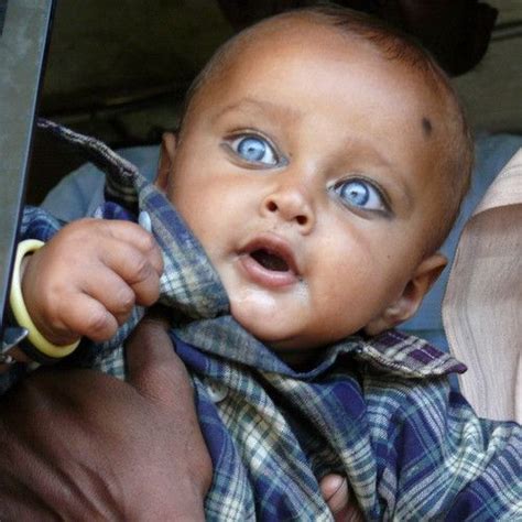 Historical tribes with blue eyes and blonde hair: Young boy with brilliant blue eyes in Rajasthan, India ...