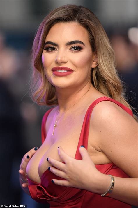 Megan Barton Hanson Struggles To Contain Her Cleavage In A Red Dress At Ted Bundy Film Premiere