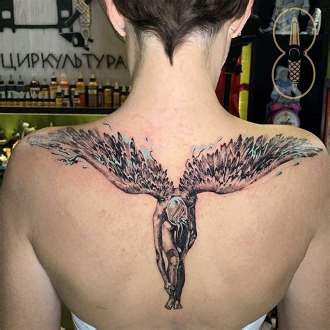 Fallen Angel Wings Tattoo