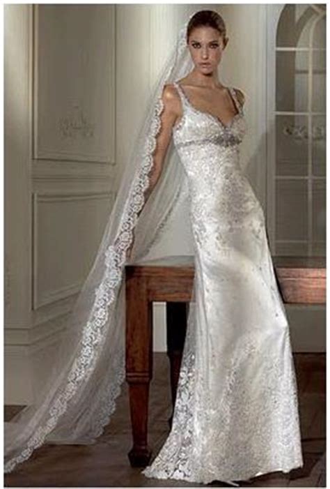 Every bride has an idea in her head about what the perfect wedding dress should look like. Gorgeous long mantilla veil worn with Pronovias wedding ...