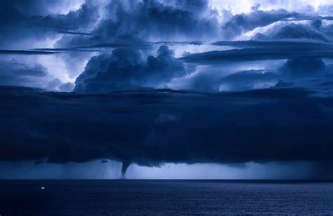 Tornadic Waterspout During Strong Lightning Storm In Italy In Pictures