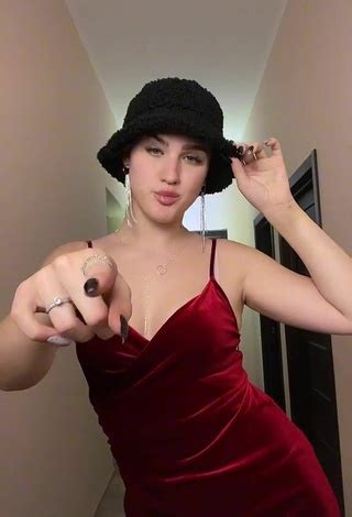 Sexy Lilia Shows Cleavage In Red Dress Sexyfilter Com