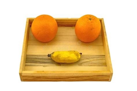 Fresh Oranges And Banana Stack Smiling Shape In Wooden Box On Stock