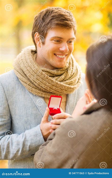 Man Proposing To A Woman In The Autumn Park Stock Image Image Of