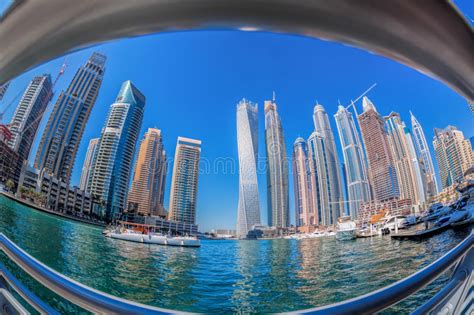 Dubai Marina With Boats Against Skyscrapers In Dubai United Arab