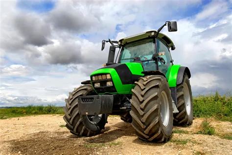 Farmer On Tractor Stock Photos Royalty Free Farmer On Tractor Images