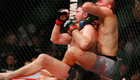 Ufc 217 St Pierre Makes History Chokes Out Bisping To Win 185 Title