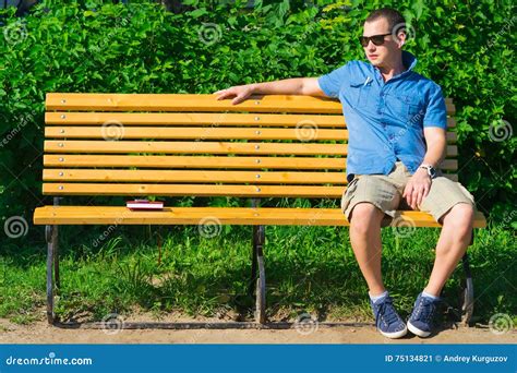 Young Man Sitting On The Bench Stock Image Image Of Handsome Summer