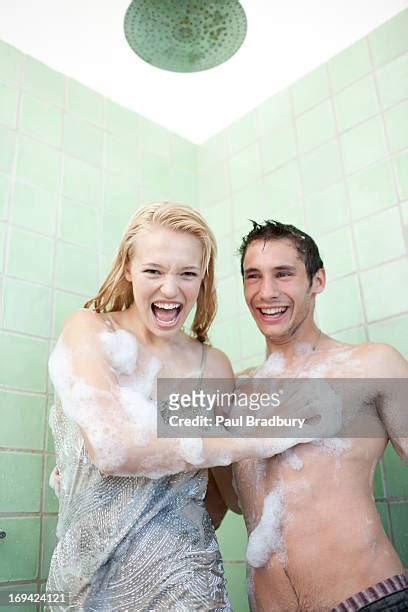 Shower Man Woman Washing Photos And Premium High Res Pictures Getty
