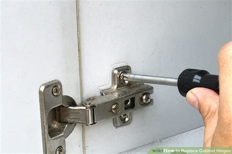Clean the solvent residue with a little rubbing alcohol. 3 Ways to Replace Cabinet Hinges - wikiHow