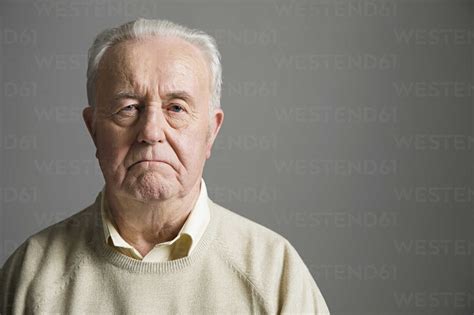 Senior Man Frowning Stock Photo