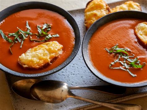 Use a small knife to cut around the inside of each loaf in a neat circle; Quick Creamy Tomato Soup Recipe | Rachael Ray | Food Network