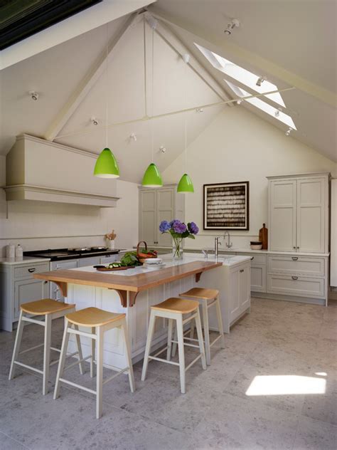 Another idea is to remove cupboards below your existing counter space. 16 Great Design Ideas for Kitchen Islands with Breakfast ...