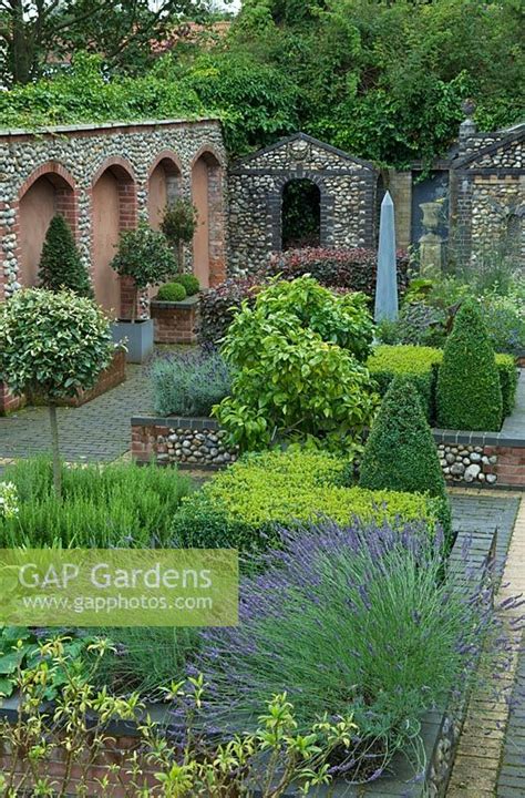 Gap Gardens Formal Walled Courtyard With Flint Folly And Raised Beds