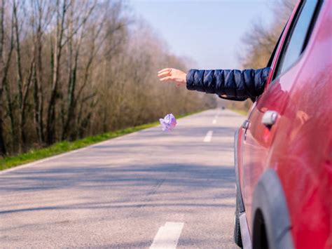 Person Throwing Trash Out Of Car Window Stock Photos Pictures