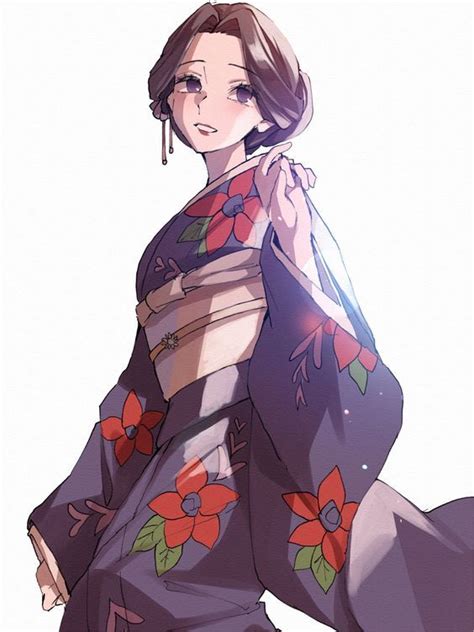 A Woman In A Kimono With Flowers On It