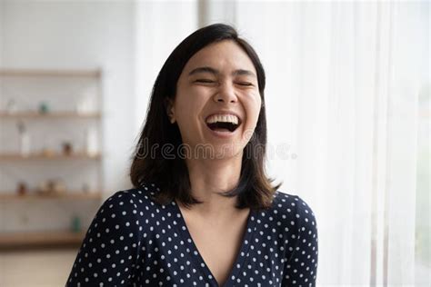 Overjoyed Asian Woman Have Fun Laughing At Joke Stock Image Image Of Asian Enjoy 199289043