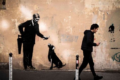 £1 million banksy artwork shreds itself! New works by elusive street artist Banksy on migrants discovered in Paris - ABC News