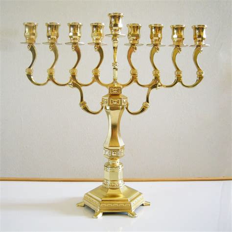 Maybe you would like to learn more about one of these? Hanukkah Menorah Candle holder, Gold plated, Jewish ...