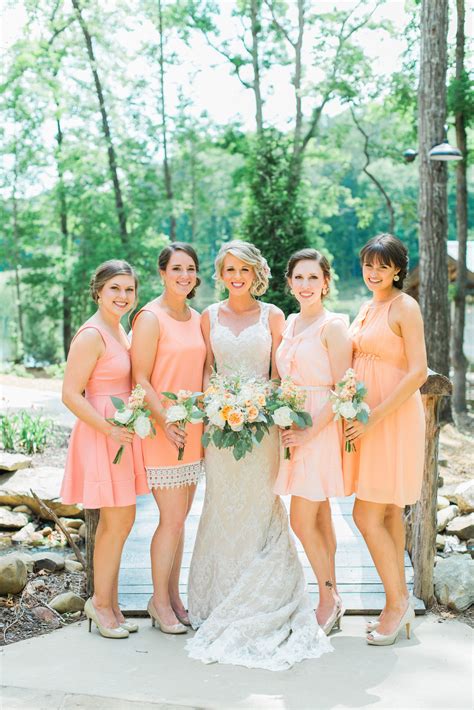 The Bride And Her Bridesmaids Pose For A Photo