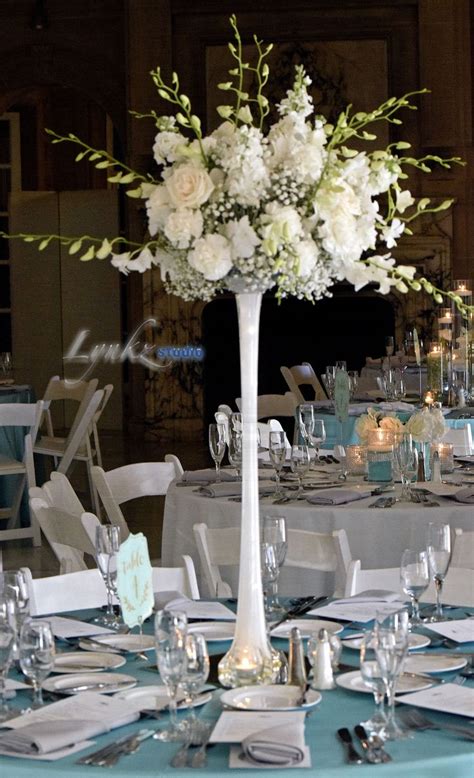 The best deal on those can be found by purchasing our ostrich feather centerpieces in kits, which come with vases, foam bouquet holders and. Best 25+ Eiffel tower vases ideas on Pinterest | Feather centerpieces, Ostrich feather ...