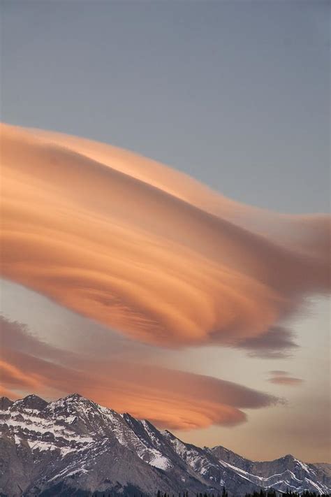 Clouds At Sunset Above Mountain Peaks Photograph By Eryk Jaegermann