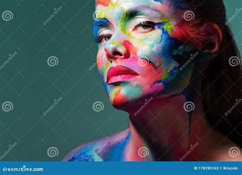 Fashion And Creative Makeup Young Beautiful Woman Abstract Face Art