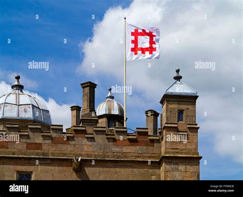 English Heritage Flag Flying On A Pole On Top Of Bolsover Castle In