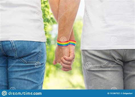 Male Couple With Gay Pride Rainbow Wristbands Stock Image Image Of