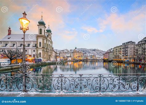 Historic City Center Of Downtown Lucerne With Chapel Bridge And Lake Lucerne In Switzerland