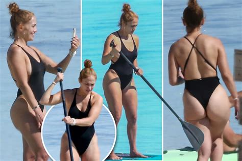 Jlo 51 Shows Off Her Famous Butt In A Black Thong Swimsuit As She