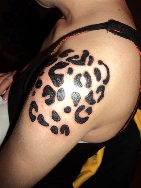 Leopard Spots Tattoo On Girls Shoulder