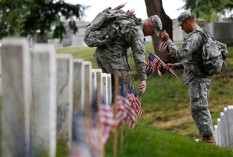 Memorial Day Soldiers Placing Flags At Arlington Reflect On Service