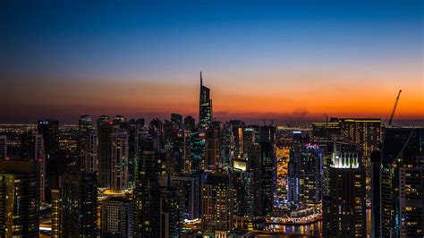 Download Wallpaper 2560x1440 Night City Skyscrapers Sunset Aerial View City Lights