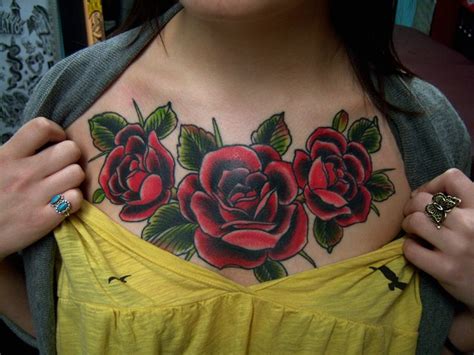 These colours really make the entire piece pop. Rose chest piece tattoo. | tattoo references | Pinterest