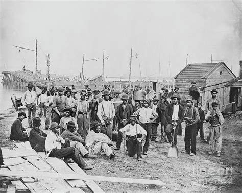 Group Of Freed Slaves Along Harbor By Bettmann