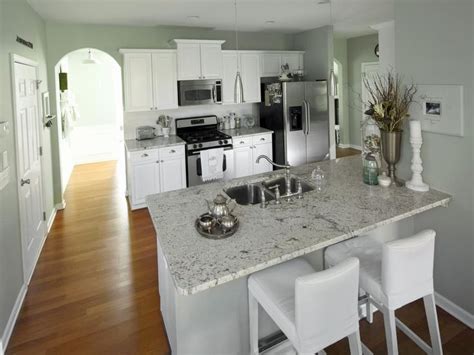 How much does a laminate counter top cost? White Kitchen With Mint Green Walls and White Granite ...