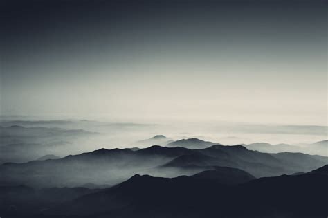 Silhouette Of Mountain Under Cloudy Sky Photography Simple Background