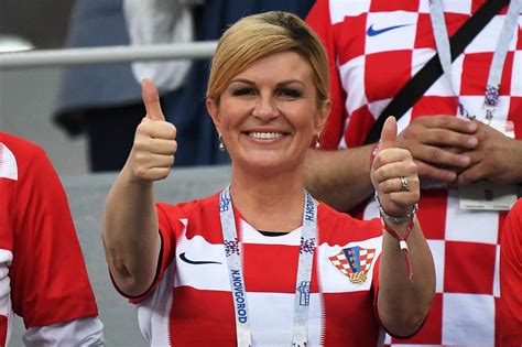 √ croatian president kolinda grabar kitarović fifa world cup 2018 soaked but smiling croatian