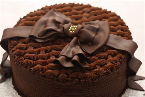 This 6 inch birthday cake is complete with easy buttercream flowers and swirls. Chocolate Birthday Cake - Birthday