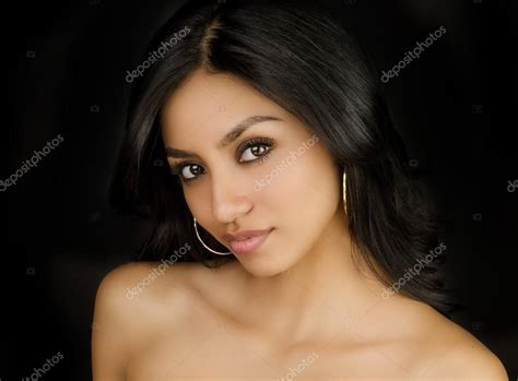 Beautiful Exotic Young Woman Stock Photo By ©avfc 107742796