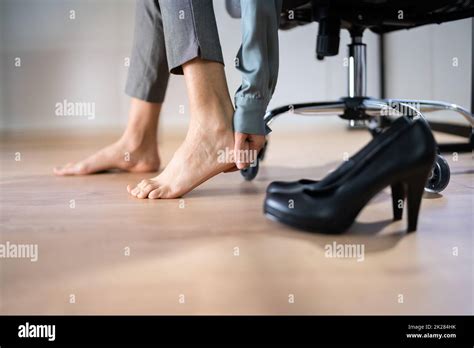 Businesswoman Rubbing Her Foot Hi Res Stock Photography And Images Alamy
