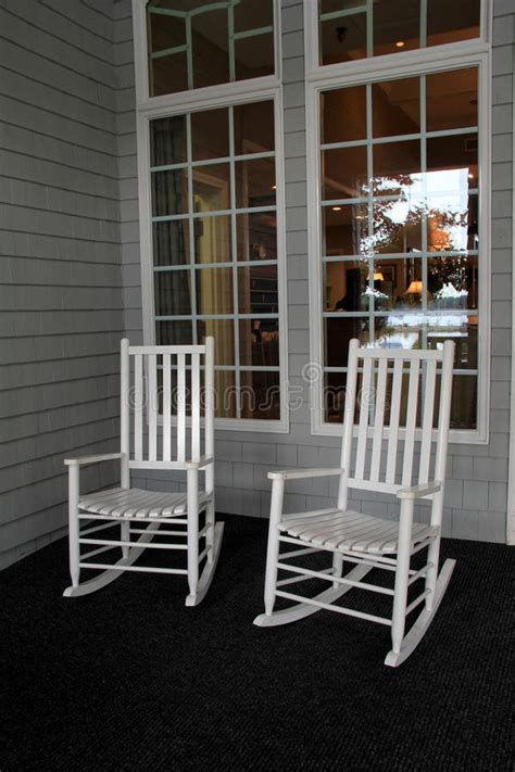 White front porch rockers spindles. Two White Adirondack Rocking Chairs On Front Porch Stock ...